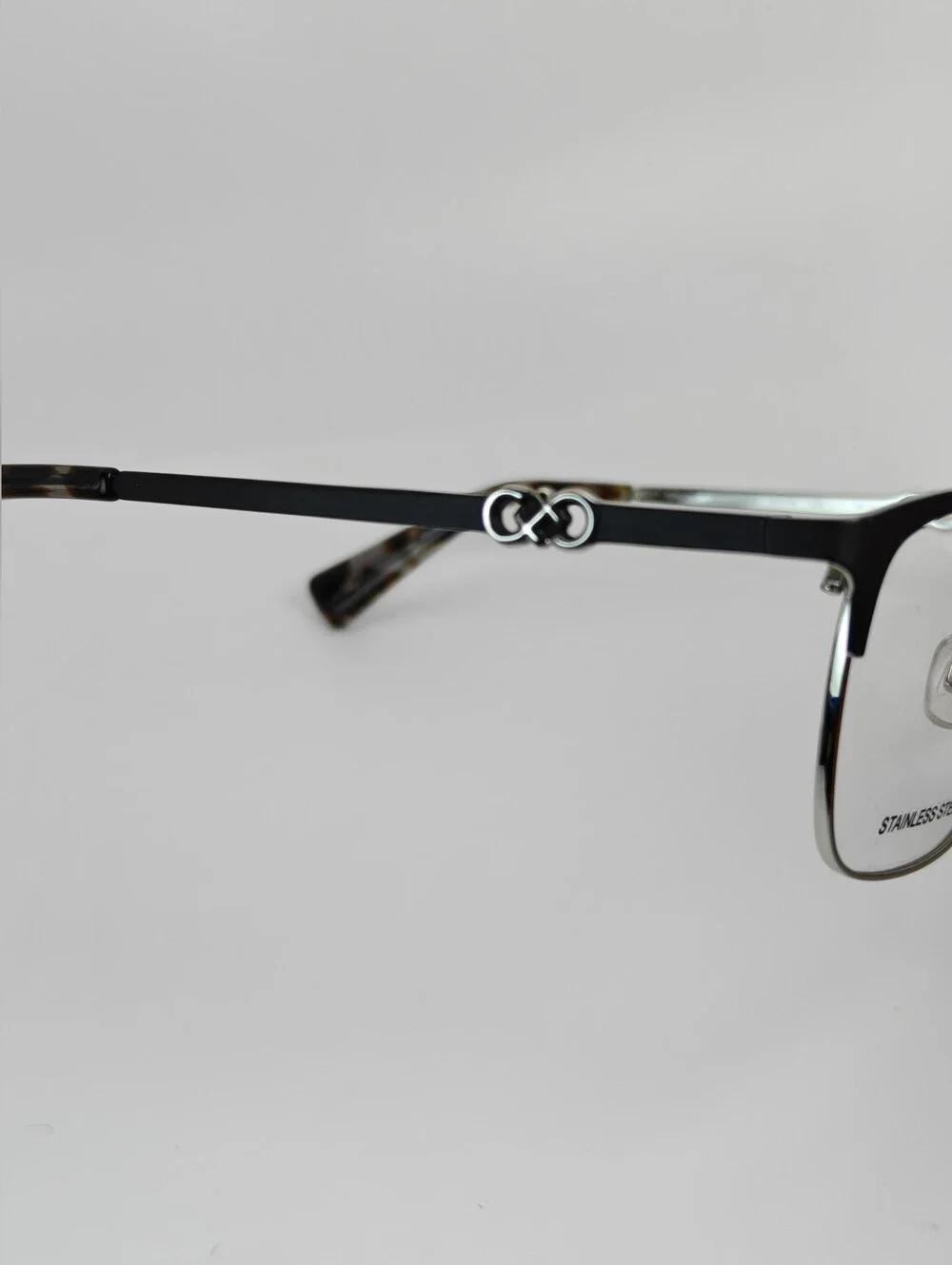 Cole Haan CH 5009. Black and Highly Polished Stainless Eyeglasses.